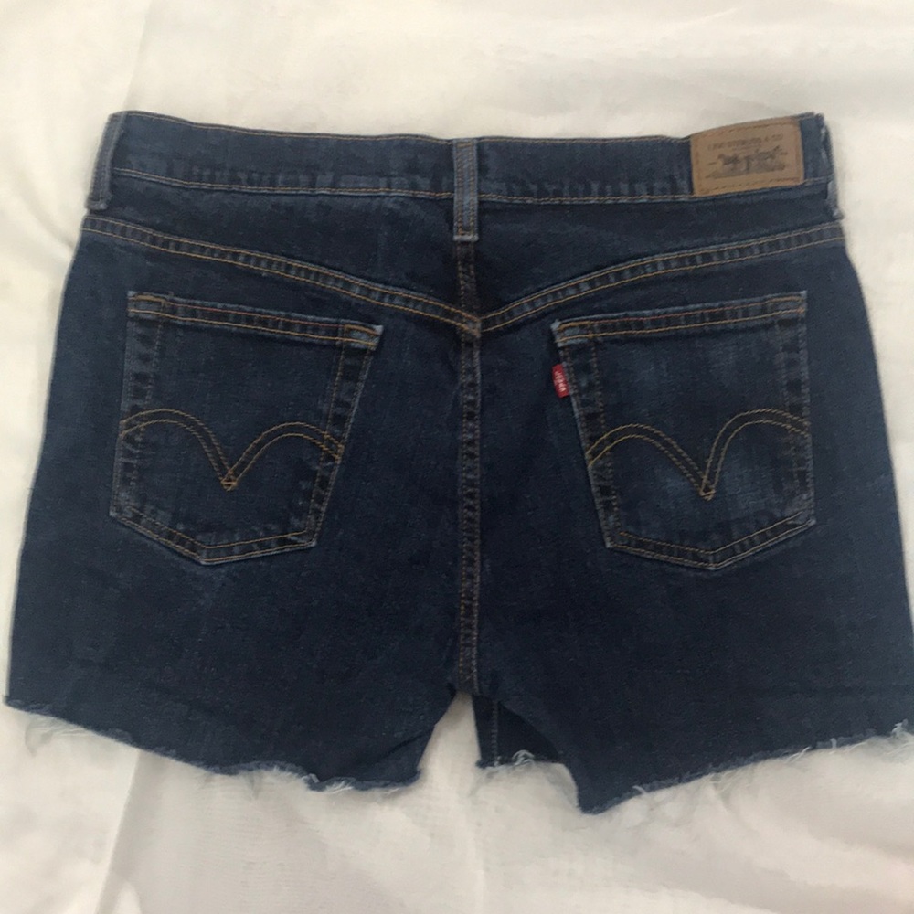 Levi’s 515 distressed edge cutoffs Size 10